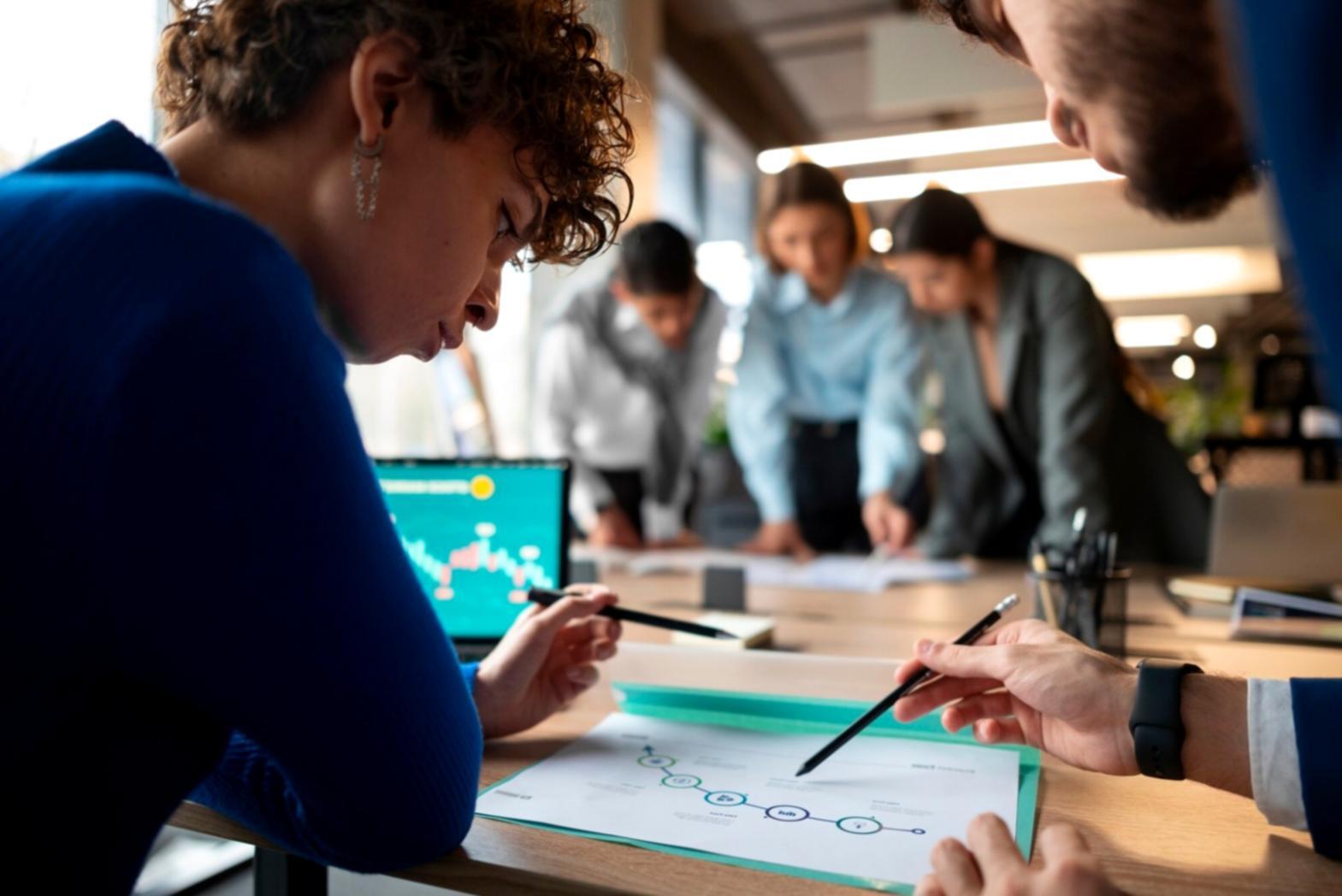 Financial professionals analyzing working capital data and cash flow patterns